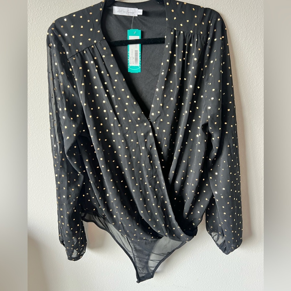 NWT all in favor black and gold polka dot style body suit